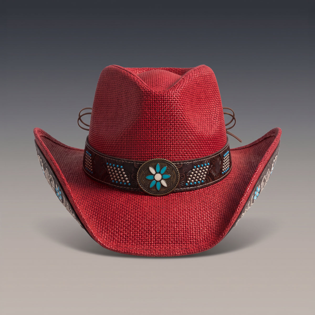 Chapeau de cowboy Azure en paille rouge, bandeau brodé et médaillon turquoise, vu de face