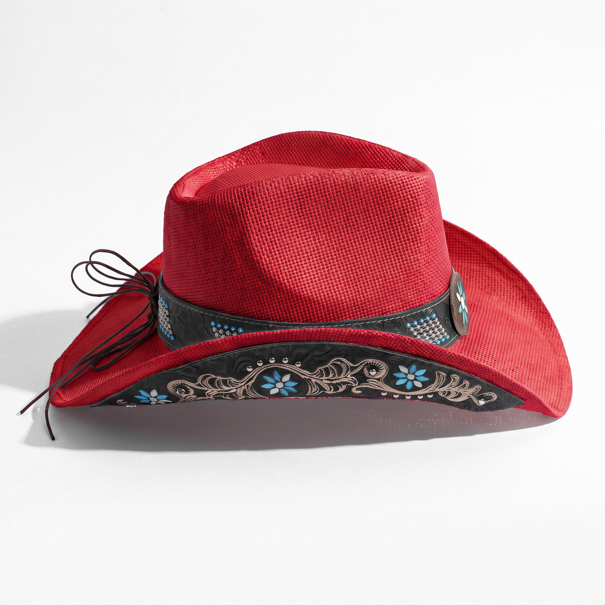 Chapeau de cowboy Azure en paille rouge, vu de profil, dessous du bord brodé