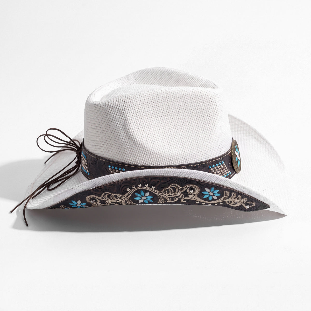 Chapeau de cowboy Azure en paille blanche, vu de profil, dessous du bord brodé